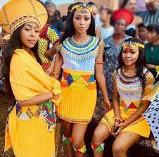 Zulu Patterned Yellow Skirts Beaded Belts Capes Head Bands And Isicholo Hat Zulu Traditional Attire African Traditional Dresses South African Traditional Dresses