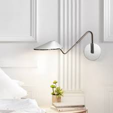 This wall sconces lighting has a fixed base, a metal lampshade and a copper lamp handle. Wall Lights Reading Lights High Quality Designer Wall Lights Architonic