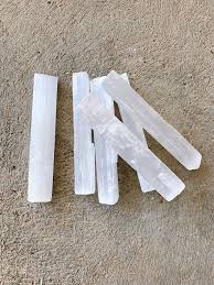 Place your tumbled stone that aligns with what you're looking to bring in on top of your paper. Everything You Should Know About Cleansing Crystals The Wayward Lifestyle Wellness Astrology