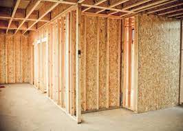 How To Build A Partition Wall In A Basement With A Concrete Floor Hunker Basement Remodeling Basement Decor Finishing Basement