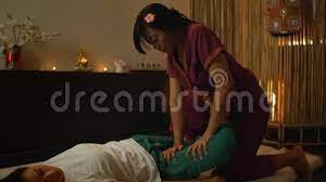 Asian Performs Massage in National Clothes of Thailand. Asian Spa Salon in  Europe Stock Footage - Video of manual, healing: 165979020