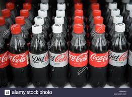 Coke And Diet Coke Bottles On Supermarket Shelves In Uk Which Has Stock Photo Alamy