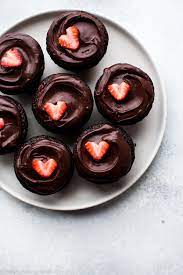 Heavy whipping cream 1/3 cup powdered sugar 4 tablespoons food processed strawberries (take some fresh strawberries, wash them, remove the stems, and throw them in the food processor until they become a thick, seedy. Chocolate Covered Strawberry Cupcakes Sally S Baking Addiction
