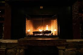 Is it possible to cover this fireside hearth with slate? Free Stock Photo Of Logs Burning In Raised Hearth Fireplace