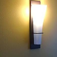 Turn off power supply to the bathroom at the circuit breaker to eliminate the risk of electrocution while you work. How To Replace A Wall Mounted Light Fixture Sconce