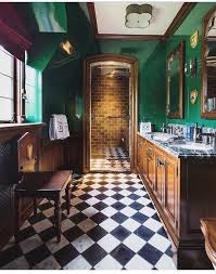 Going for green in your kitchen gives it a timeless look. Stunning Emerald Green Bathroom With Rich Wood Accents Green Bathroom Kitchen Marble Bathroom Decor