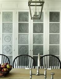 These include a frame around a central panel. Hausporta Tintastic Ideas For Decorating With Tin Tiles