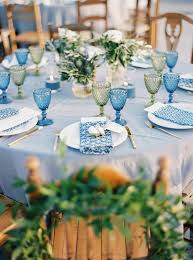 Bohemian Grecian Wedding In Santorini Greece Tie The Knot Santorini Wedding Events Greek Wedding Theme Blue Table Settings Wedding Table Decorations Diy