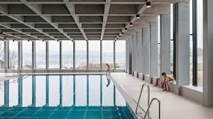 Illiz Architektur Suspends Children S Swimming Pool Above Former Underground Troop Billet In Zu Swimming Pool Architecture Indoor Swimming Pools Swimming Pools