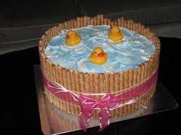 Rubber ducks are so cute and easy to use to decorate diaper cakes to use as centerpieces as well as diy frosted cakes and cupcakes making there are so many inexpensive baby shower decorations, favors and ideas for a rubber ducky baby shower that are gender neutral, bright and so much fun. Duck Baby Shower Cakes And Diaper Cakes You Must See