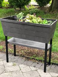 This keter xl urban bloomer elevated planter can be used to plant flowers, herbs or vegetables for added versatility in your outdoor space. Planning A Vertical Patio Garden Momhomeguide Com