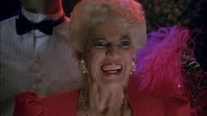 Scott's mom's incredibly frightening happy face.