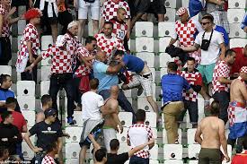 Modric bends over, holding his groin and walks off with an injury. Croatia Facing Uefa Action After Flares And Fighting Bring Halt To Czech Republic Clash Daily Mail Online