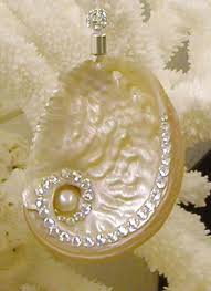 Seashell art starfish beach ornaments sea crafts painted shells beach christmas clams sea glass jute star fish beach ornament with purple clams | etsy star fish beach ornament with purple clams shells, pearly snail shells and white ridged shells on a cloth background with brown jute edging. How To Make Seashell Christmas Ornaments Holidappy