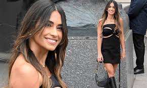 Antonela Roccuzzo puts on a leggy display in mini dress as she attends  Louis Vuittons show | Daily Mail Online