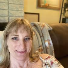 Perri Drew showing off her new raincoat and rain boots !