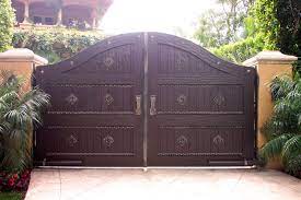 Refers to person, place, thing, quality, etc. A Access Automation Gate Spanish Style Wood Gate Image Proview