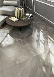 The smooth finish and high sheen of thisthe smooth finish and high sheen of this wall tile will bring a clear, neat look to your room. Ceramic Floor Tile Marble Look Titan Vives Azulejos Y Gres Ceramic Floor Ceramic Floor Tile Living Room Flooring