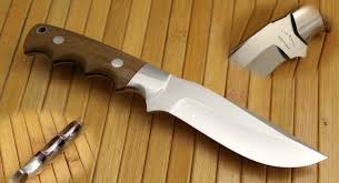 Find A Way Out Of The Witch Hunters Outpost This Finger Groove Hunter Has A 4 1 2 D2 Tool Steel Blade With Mammoth Bone Handle That S Highlighted With Red Liners Hunting Knife Tool Steel Knife