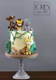 White sheetcake from costco with wilton blue sugar sprinkles and sugar gems with disney store figurines. Lori S Custom Birthday Cakes In The San Diego Area