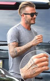 David Beckham Gets Jay Z Lyric Tattoo See The Pic Beckham Hair David Beckham Hairstyle David Beckham Tattoos