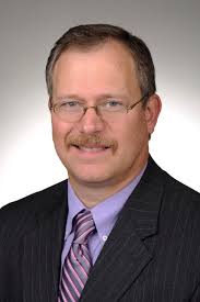 Greg Roution Former FLOYD County Coroner