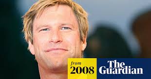 Eckhart goes from fighting Batman to battling aliens