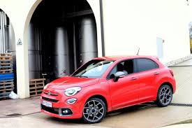 Dedicated blue fabric seats with fiat monogram. Fiat 500x Sport Carlito Abarthino Mipiace At