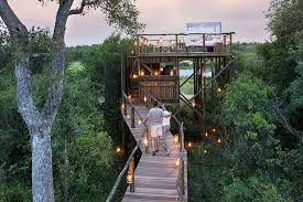 In addition to its exquisite lodges, the fabulous lion sands game reserve boasts three magical treehouses, all set amidst the wilderness and equally staggering, the tinyeleti treehouse offers alfresco riverside accommodation on a 50 sq m deck provided with a lavishly comfortable bed, torches. Lion Sands Tinyeleti Treehouse Treehouse Experiences Luxury Lodge In Lion Sands Private Game Reserve View Information Pictures And Book Great Deals Online Lion Sands Kruger Private Game Reserve Safari Com