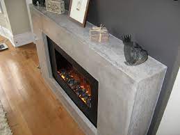 This fireplace comes equipped with a traditionally designed mantel and an oversized firebox that exudes incredible realism and clarity. Modern Electric Fireplace Modern Family Room Toronto By Concrete Elegance Inc Houzz
