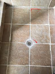 The primary goal of the shower base is to create a sloped floor angled toward the drain so the waste water flows efficiently into the pipes. How Do I Fix Squishy Tiles In Shower Floor Home Improvement Stack Exchange