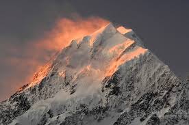 Wind Blown Snow On The Summit Of Aoraki Mt Cook Is Illuminated At Sunset Winter Sunset World Most Beautiful Place Sunrise Images