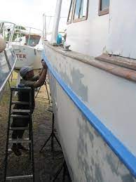 How To Paint Your Old Fiberglass Boat And Make It Look New Again Boat Restoration Sailboat Restoration Hull Boat