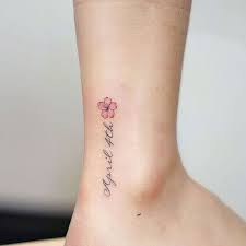 Small Memorial Cherry Blossom Tattoo Design On The Ankle Flower Tattoo On Ankle Blossom Tattoo Cherry Blossom Tattoo Meaning