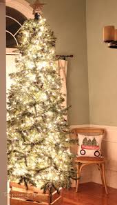 How To Put Lights On A Christmas Tree So That It Glows The Turquoise Home Creative Christmas Trees Christmas Tree Lighting Live Christmas Trees