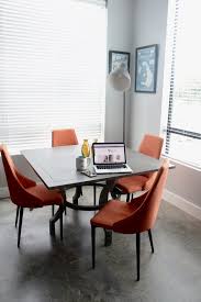 Orange seating for every space. Dining Room Table With Safavieh Greta Hollar