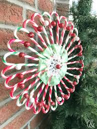 Sweeten your christmas decorating by incorporating holiday candies into centerpieces and arrangements. Diy Christmas Candy Cane Wreath And Then Home