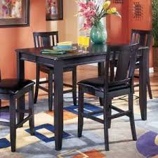 Carlyle Butterfly Leaf Table By Ashley Furniture Ahfa Pub Table Dealer Locator Furniture Pub Table And Stools High Table Set