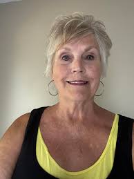 This is me. I'm almost 75. What do you think of my cut ? I do not and will  not color my hair.