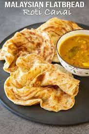 Authentic Malaysian Flatbread Recipe Or Famously Known As Roti Canai Fluffy And Soft With Crispy Edges This Homemade Ro Roti Recipe Recipes Roti Canai Recipe