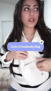 Keep cozy and chic with this fleece crossbody bag! Combining fashion with  function, this bag features a soft fleece exterior for a trendy yet snug  look. Perfect for cold weather, it offers a ...