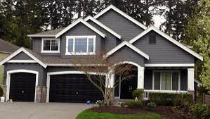 Accenting this grey house with black/dark shutters is a perfect contrast! Pin By Elisabeth Bueghly On House Exterior Ideas Gray House Exterior House Paint Exterior Exterior Paint Colors For House