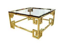 Dette er en artikel, der fokuserer på skønheden i vintage og antikke designs. Greek Key Table Greek Key Brass Coffee Table Glass Top Table