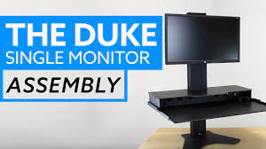 It is highly functional for almost any user because of its large adjustment range, dual ergonomic function and simple to operate height adjustment. Assembly The Duke Single Monitor Duke Adjustable Standing Desk Converter Youtube