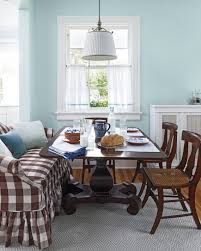 The Mahogany Table In The Dining Room Is Flanked By A Brown Buffalo Check Sofa And Antique Tiger Maple Chairs From Deborah S M Dining Room Blue Home Home Decor