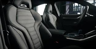 The interior is basically the same as a regular 3/4 series but with the hatchback trunk lid of a gran coupe and the ix's enormous, curved infotainment display applied to the dash. Gwnc32xt0 P22m