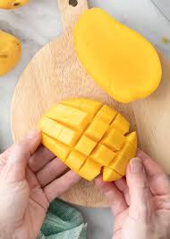 A mango has one long, flat seed in the center of the fruit. How To Cut A Mango Recipe Love And Lemons