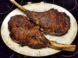 A cowboy steak has a short frenched bone; Perfectly Grilled Cowboy Ribeye Steak Tasty Kitchen A Happy Recipe Community