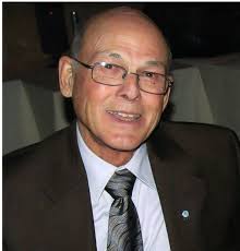 Dr. Laurent G. Walker