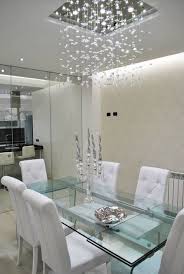 Add Sophistication To Your Meals With These Glass Dining Tables Modern Dining Tables Glamourous Dining Room Luxury Dining Room Dining Room Design